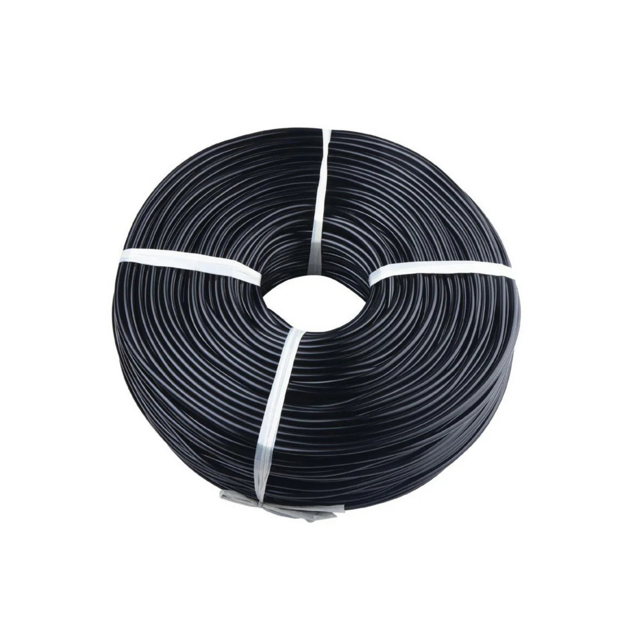 A coil of black distribution tube for micro-irrigation fittings, bound with white straps.